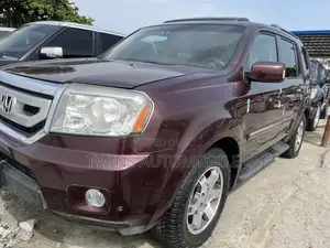 Honda Pilot Touring w/RES/Navi 4WD (3.5L 6cyl 5A) 2011 Burgundy