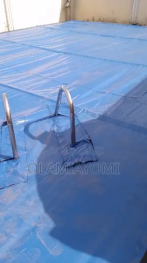 Automated Pool Cover Using Remote and Phone Control