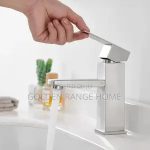 Photo - Quality Basin Hot and Cold Mixer Tap