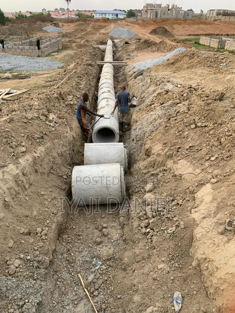 Ongoing Building Project, Drain and Fence