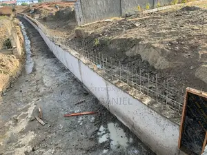 Ongoing Building Project, Drain and Fence