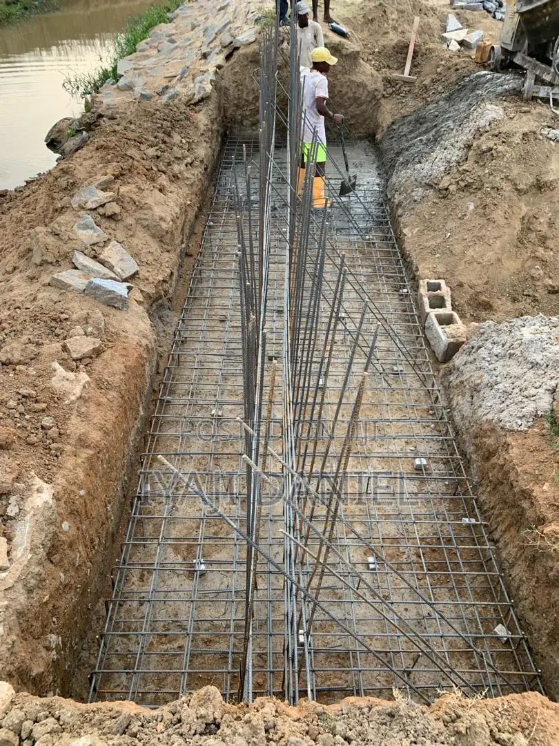 Ongoing Building Project, Drain and Fence