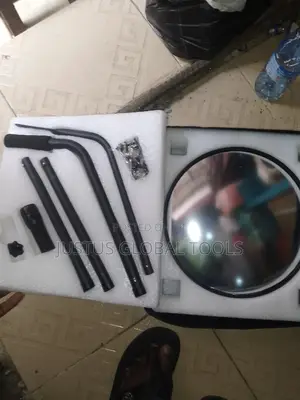 Inspection Under Car Mirror