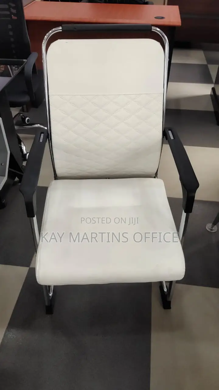 A Unique Visitors White Chair