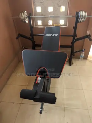 Standard Weight Lifting Bench With 50kg Barbell and Dumbell