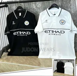 Photo - Manchester City UCL Polo Available in Black and White