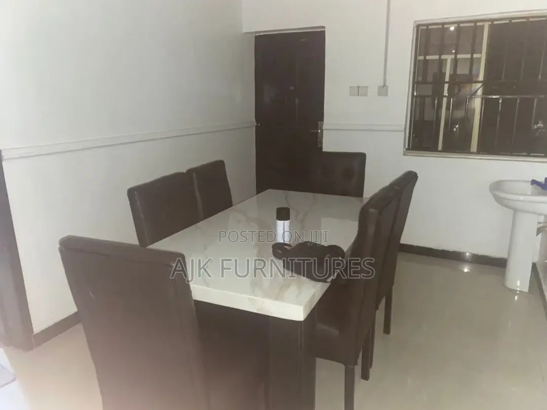6 Seater Dinning Seat With a Marble Table