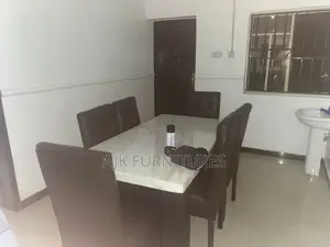 6 Seater Dinning Seat With a Marble Table