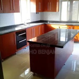 Classic Orange Color Kitchen Cabinet With Black Granite Top