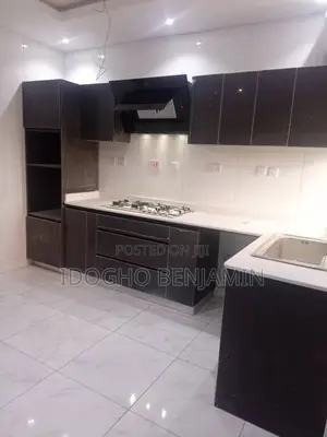 L Shape Kitchen Cabinets Built With HDF High Gloss.