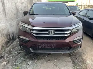 Honda Pilot Touring 4dr SUV 4WD (3.5L 6cyl 9A) 2016 Burgundy