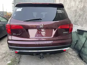 Honda Pilot Touring 4dr SUV 4WD (3.5L 6cyl 9A) 2016 Burgundy