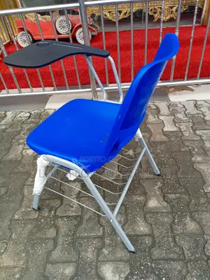 Students Studying Chair With Writing Pad