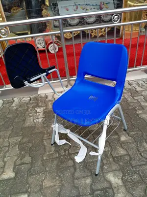Students Studying Chair With Writing Pad
