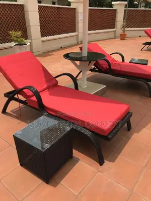 Red Sun Loungers and Side Table