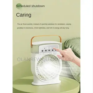 Photo - Desktop Electric Fan Air-Cooler Water Cooling Spray Fan