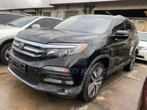 Honda Pilot Touring 4dr SUV 4WD (3.5L 6cyl 9A) 2017 Black
