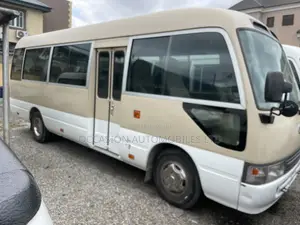 Toyota Coaster 2011 Gold