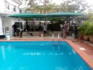 Carport With Net Coverings for Swimming Pool