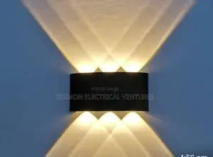 Unique Wall Light Available for Sale