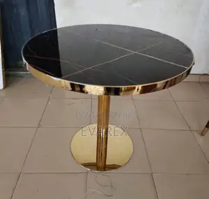 Gold Round Center Table With Black Marble Top Design