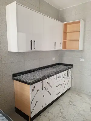 High Gloss Kitchen Cabinets With Black Marble Top