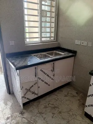 High Gloss Kitchen Cabinets With Black Marble Top