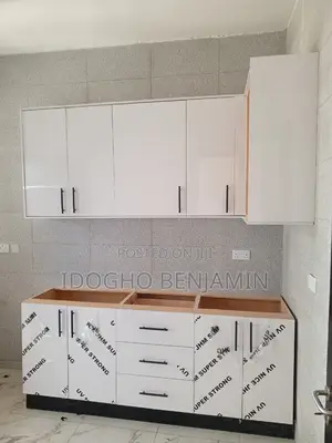 High Gloss Kitchen Cabinets With Black Marble Top