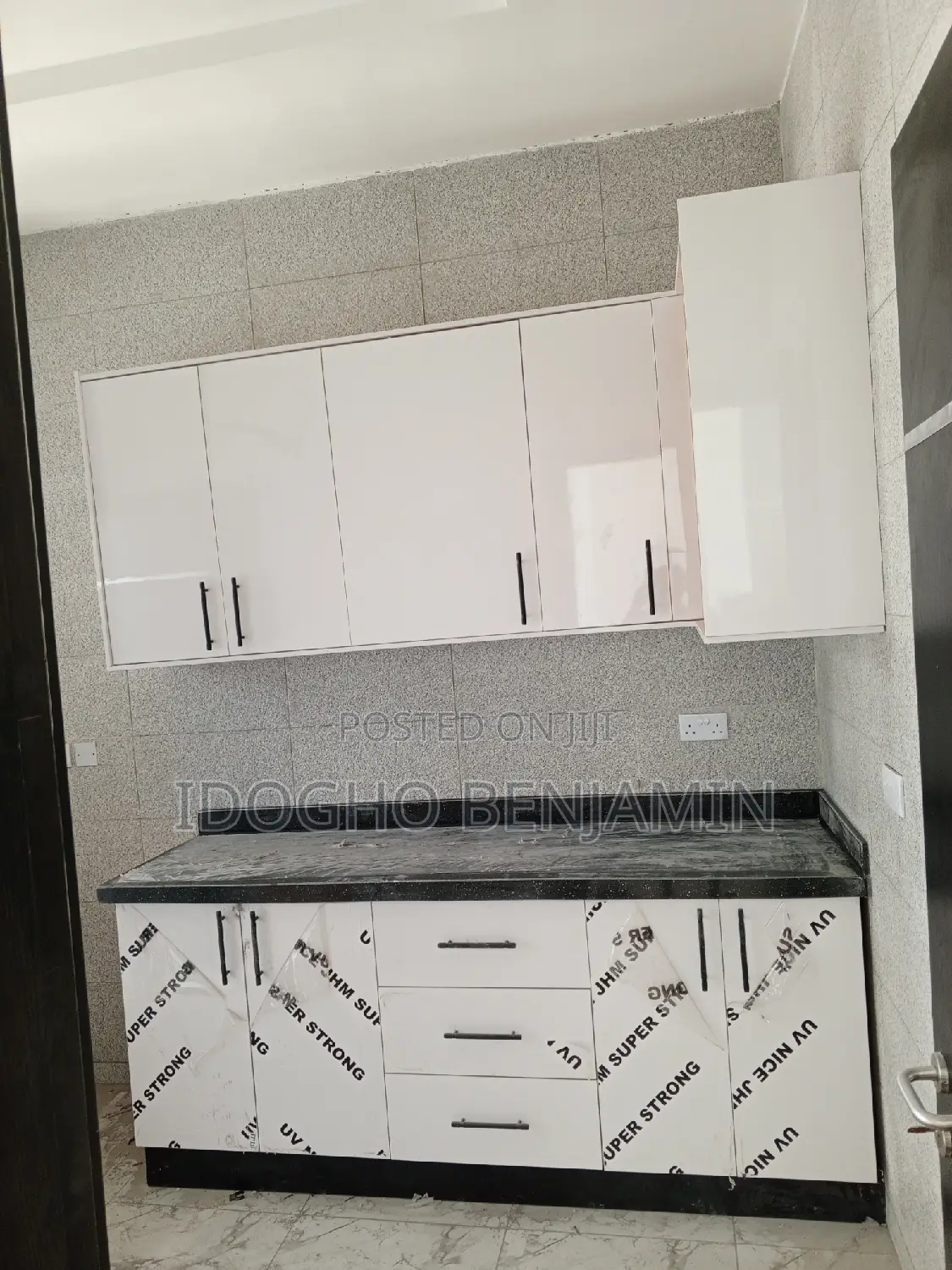 High Gloss Kitchen Cabinets With Black Marble Top
