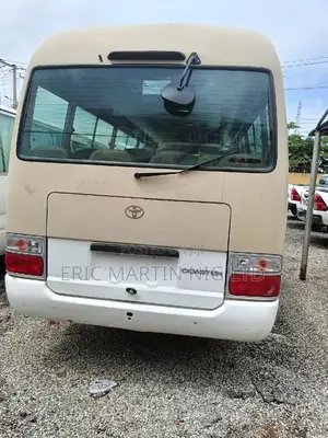 Toyota Coaster 2010 Gold