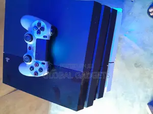 Photo - Play Station 4 500GB Console With 10 Installed Games
