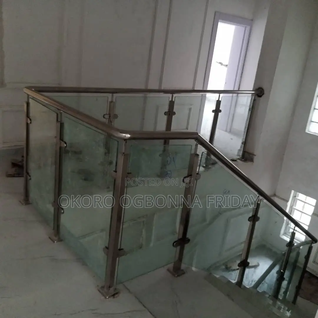 Housed Gold Railing and Design Glass