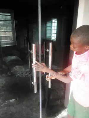 Entrance Door Installation With Tampard Frameless Glass