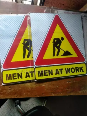 Men At Work Signage