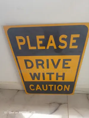 Please Drive With Caution Safely Sign