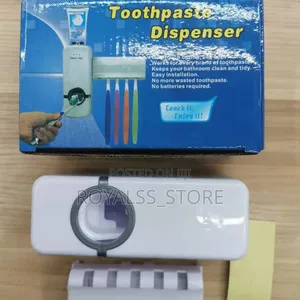 Toothpaste Dispenser and Toothbrush Holder