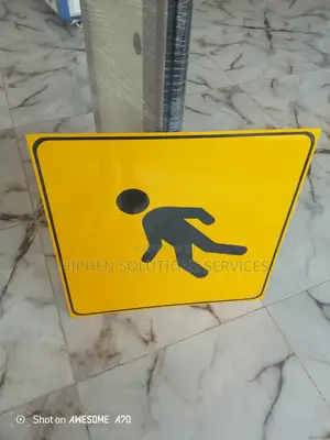 Slow Down Crossing Sign