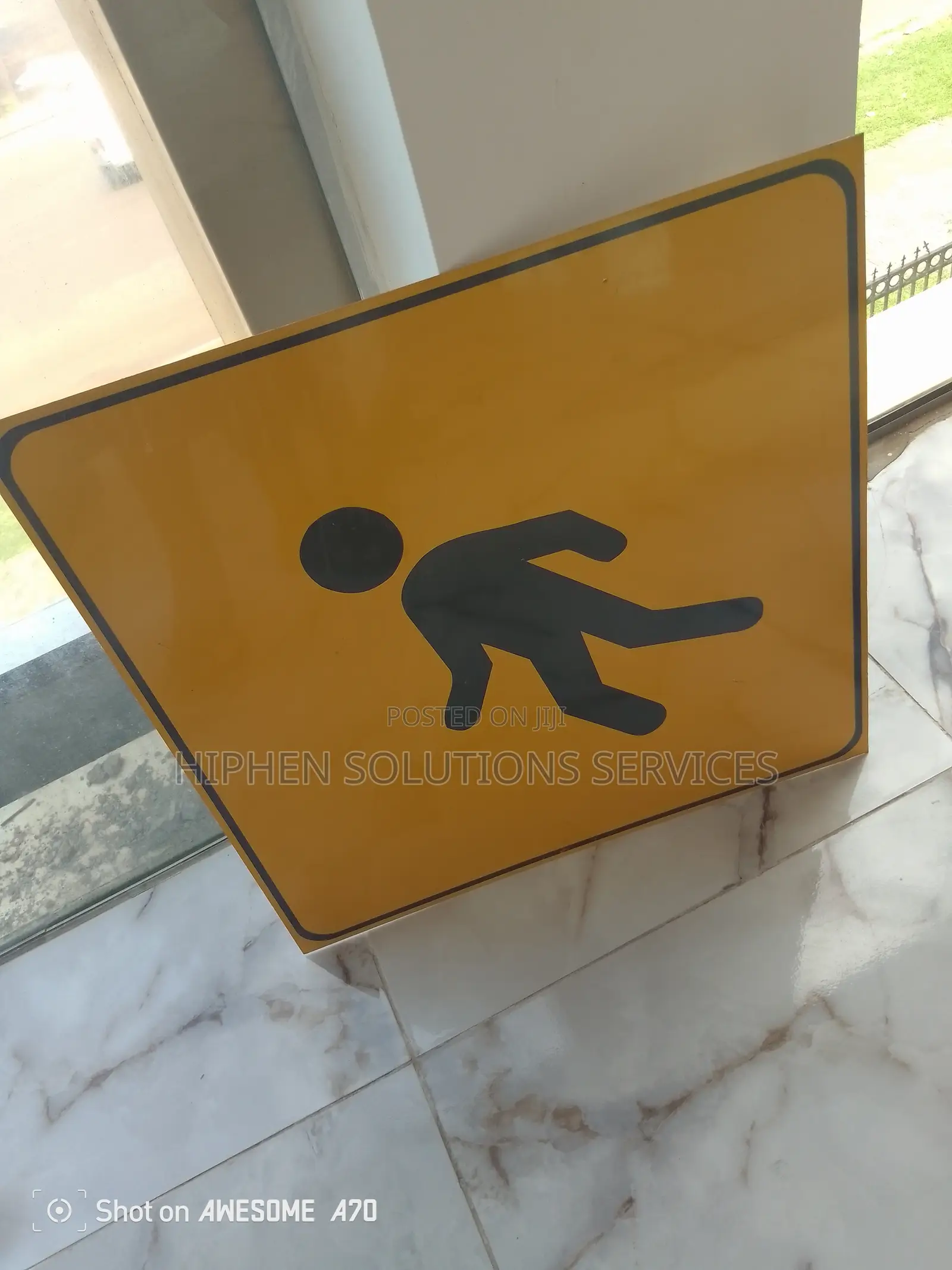 Crossing Slow Down Sign