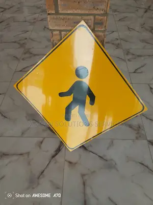 SLOW Down Crossing Sign