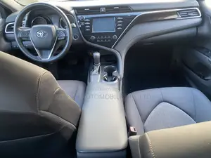 Toyota Camry LE FWD (2.5L 4cyl 8AM) 2018 Red