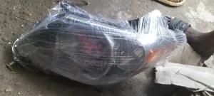Replacement Headlight for Pontiac Vibe 2010
