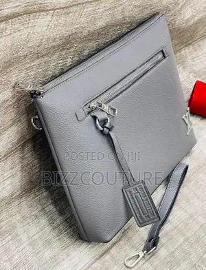 Photo - Original Louis Vuitton Zip Gray Leather Handbag Is Available