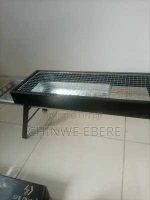 Photo - Barbeque Charcoal Grill Foldable and Portable
