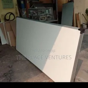 Photo - Wall Mounted White Board Available