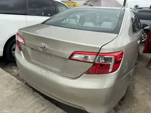 Toyota Camry L 4dr Sedan (2.5L 4cyl 6A) 2013 Gold