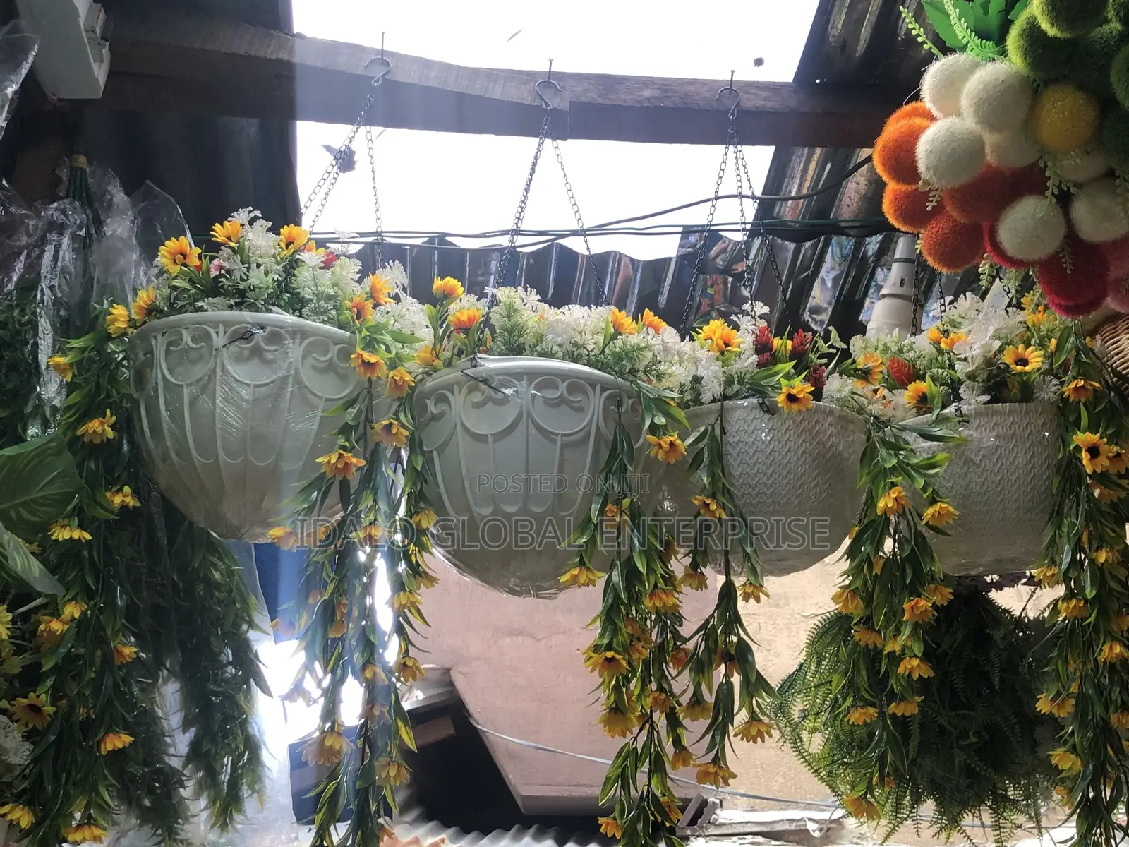 Dropping Artificial Flowers With Hanging Baskets