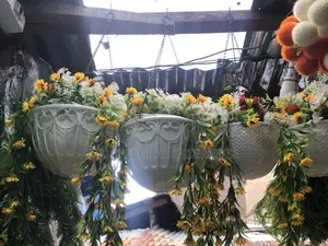Dropping Artificial Flowers With Hanging Baskets
