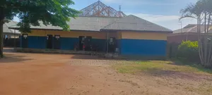 A Two Structures School on 3plots Ot Land All Fenced