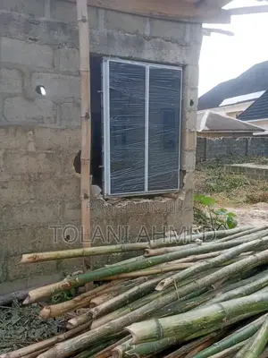 Frameless Window Attached With Burglary