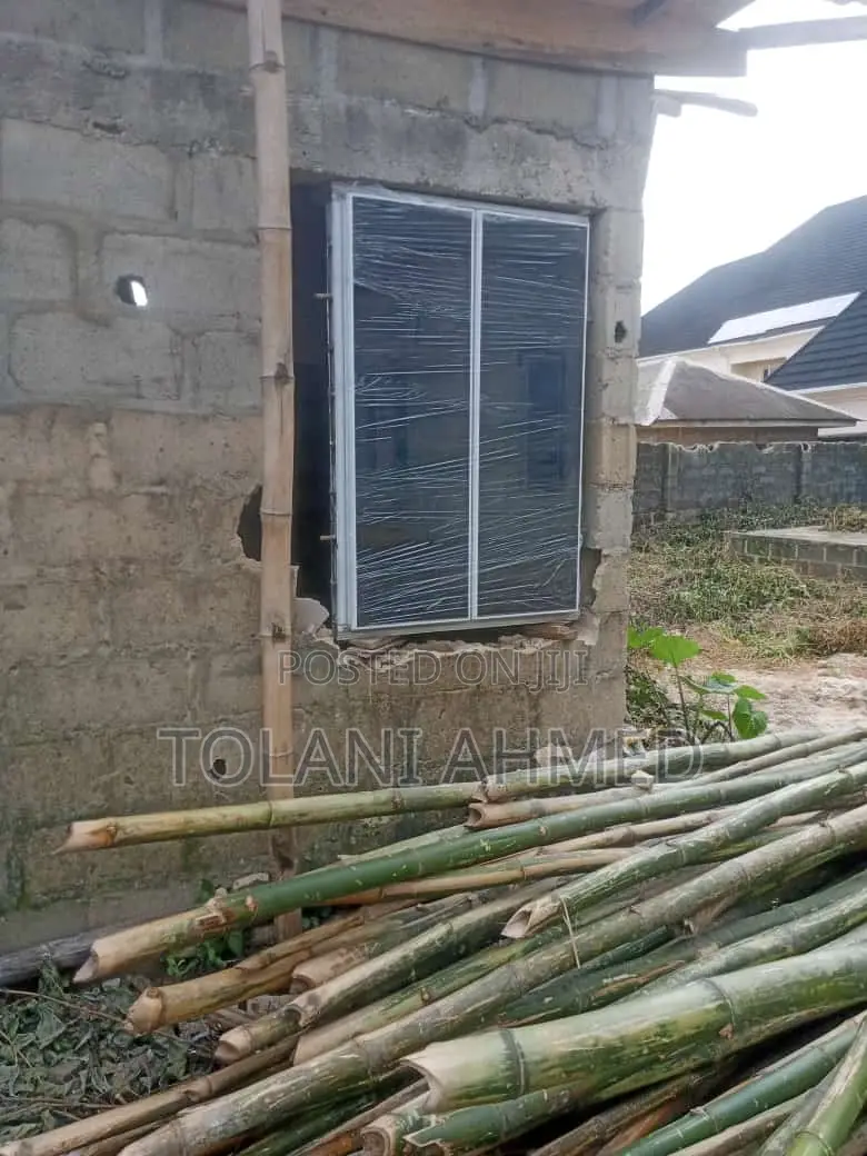 Frameless Window Attached With Burglary